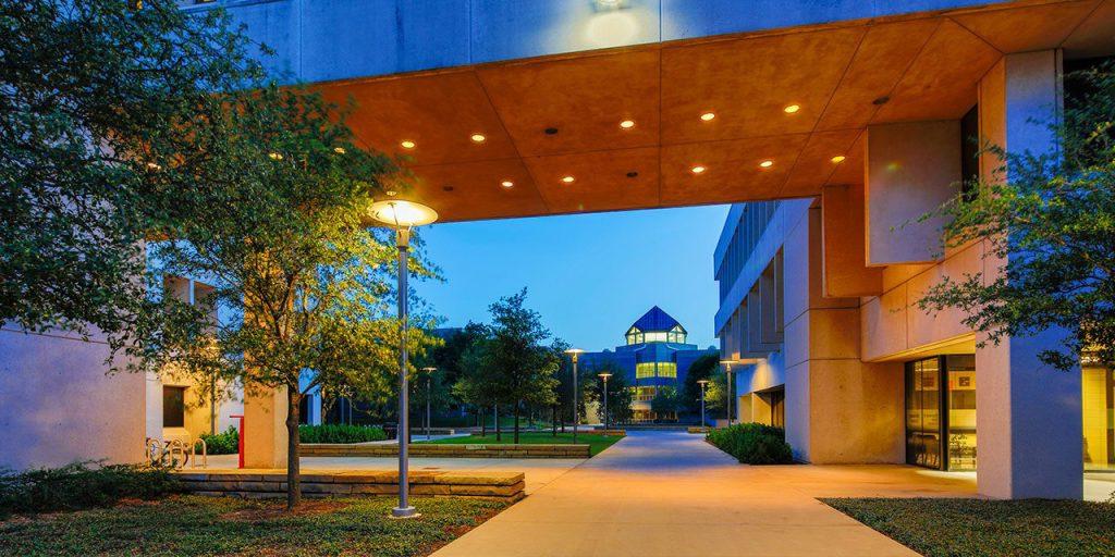 Skybridge connecting Jonsson Academic Center with Green Center at dusk