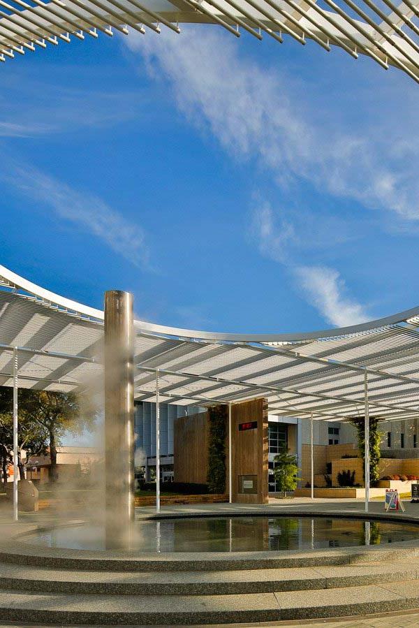 Misting column and reflecting pool at Trellis Plaza