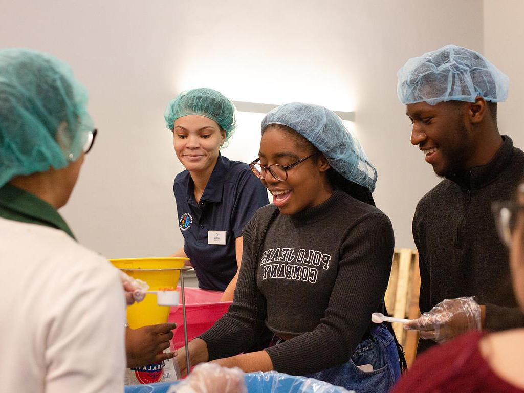Students working at a food bank event.